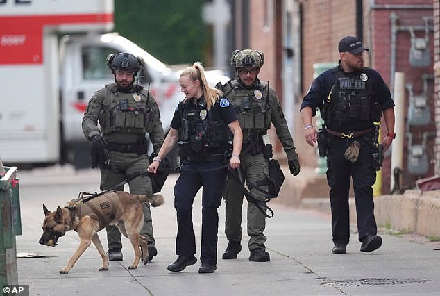 Pictured: Law enforcement officials investigate after an attack on the Pearl Street Mall Sunday, June 1, 2025, in downtown Boulder, Colorado