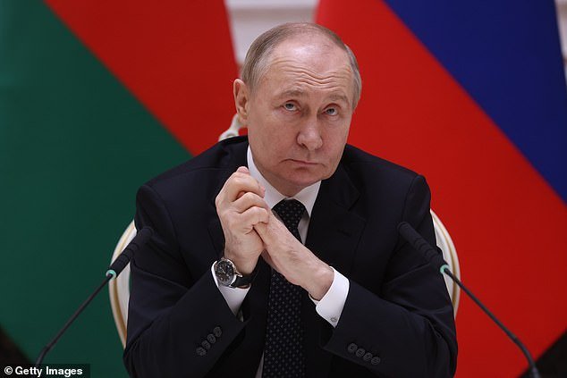 The London buildings are said to have links to Russian president Vladimir Putin, pictured at a press conference with Belarusian counterpart Alexander Lukashenko in Minsk on Friday