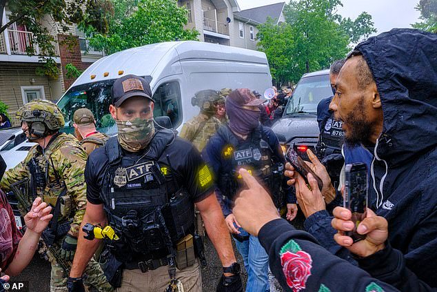 Federal law enforcement officers raided a taco restaurant in Minneapolis on Tuesday morning, triggering chaos on the streets and frenzied protests