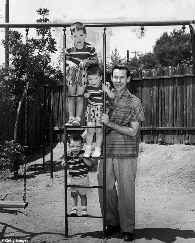 Chris' brother Rick died at the age of 39 in a car accident on June 21, 1991; Johnny pictured with his three sons in their back yard at home in Encino, California, in the 1950s