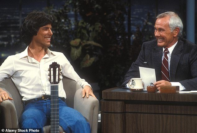 Smith shared that 'Cory is still alive,' adding, 'But I don't know. They don't see anybody that much'; Cory pictured with his dad on the Johnny Carson show in 1982