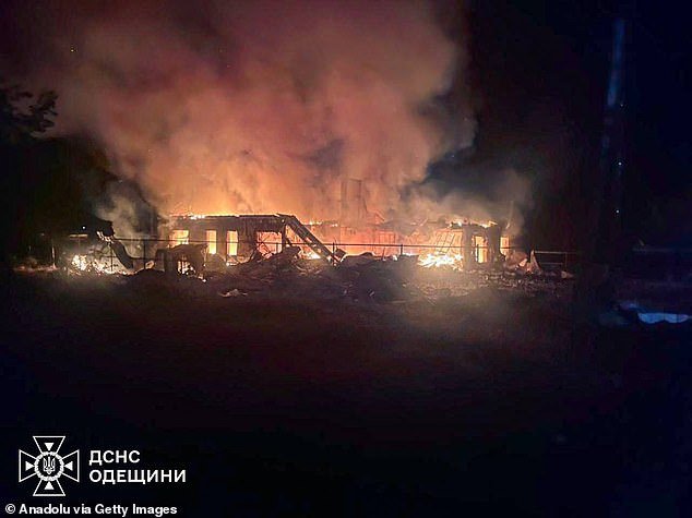 Smoke rises from a building in Odesa after a Russian drone strike on the southern city