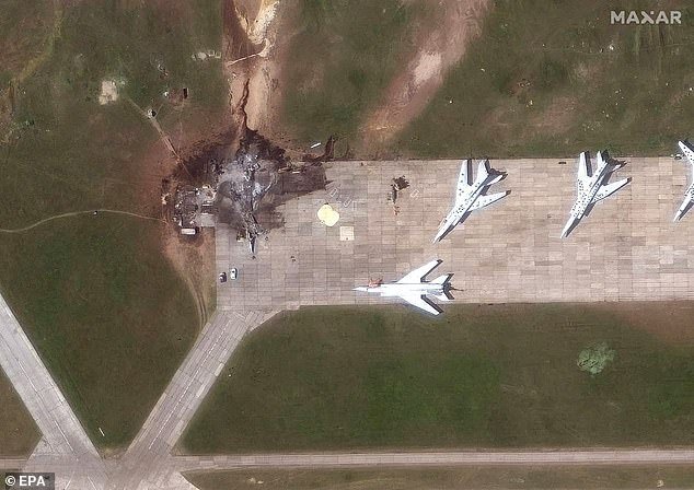 The strikes took place on Sunday, with footage released today showing flames engulfing aircraft at four military airfields (pictured Belaya Airbase)