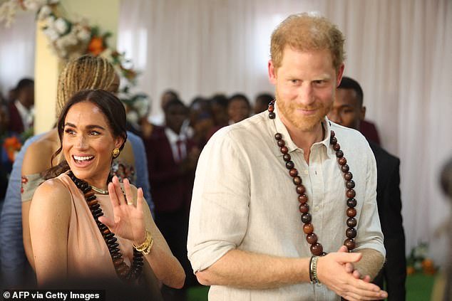 Meghan and Harry arrive at the Lightway Academy in Abuja on May 10, 2024 as they visit Nigeria as part of celebrations of Invictus Games anniversary