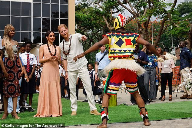 Prince Harry, Duke of Sussex and Meghan, Duchess of Sussex visit Lightway Academy on May 10, 2024 in Abuja, Nigeria