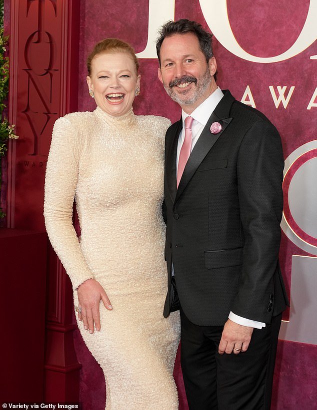 Pictured with husband Dave Lawson, whom she thanked in her acceptance speech
