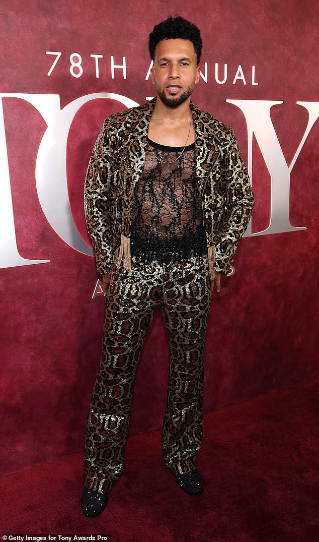 Hamilton actor Sydney James Harcourt walked the carpet in a dazzling, leopard print suit with a sheer patterned top underneath - and he had a little too much going on