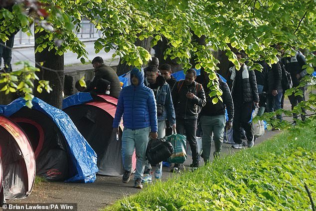 A large number of asylum seekers reportedly boarded buses by 7.30am this morning