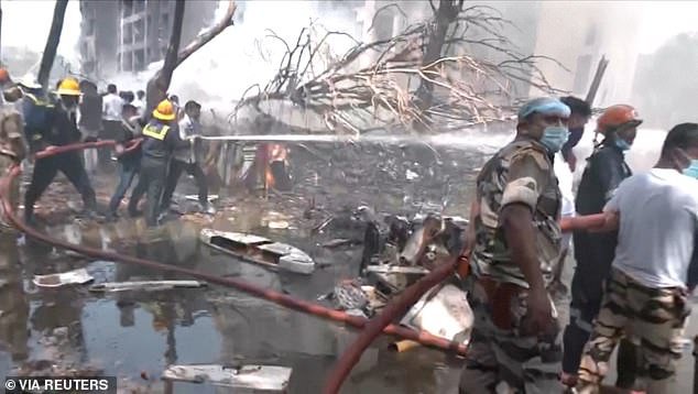 A view of the site where a plane crashed shortly after takeoff from Sardar Vallabhbhai Patel International Airport in India's western state of Gujarat on June 12, 2025
