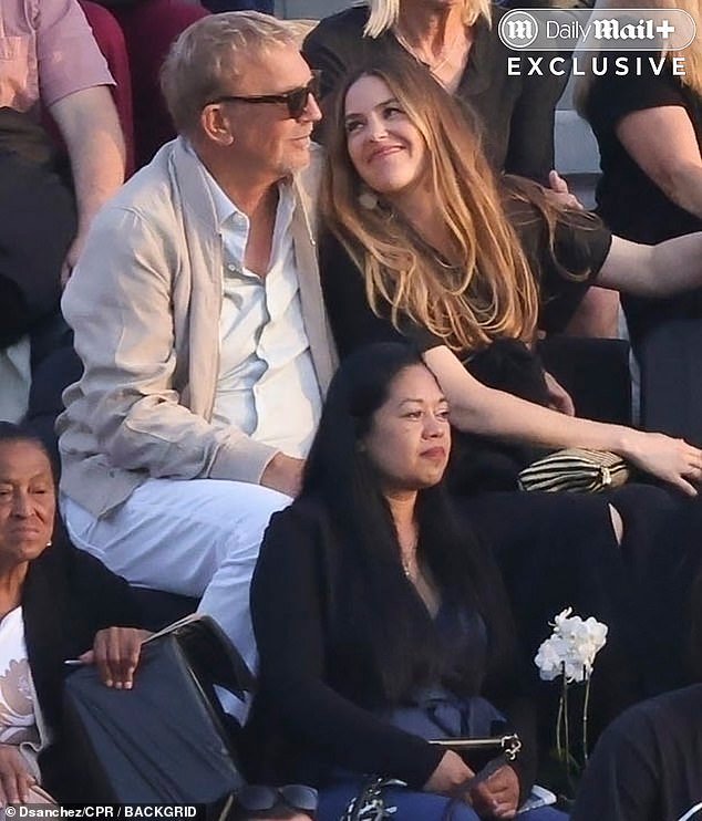 The father-daughter duo appeared in good spirits, chatting and smiling throughout the event