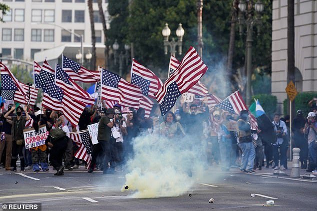 While demonstrations at the actual parade were few and far between, some 'No Kings' protests, including this one in Los Angeles turned chaotic with tear gas being dispersed