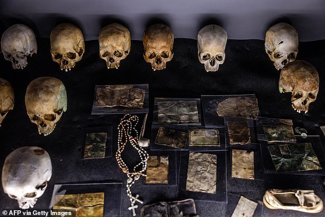 A picture taken on April 5, 2024 shows documents, belongings and skulls of victims ahead of the commemorations of the 30th anniversary of the Rwandan genocide at the Kigali Genocide Memorial in Kigali, on April 5, 2024