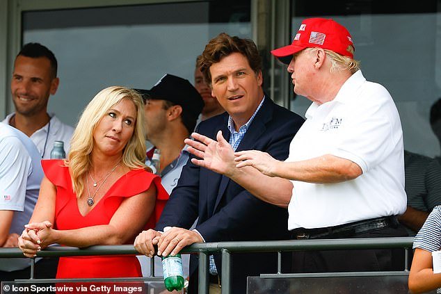 Former President Donald Trump, Tucker Carlson and Marjorie Taylor Greene during the 3rd round of the LIV Golf Invitational Series Bedminster on July 31, 2022