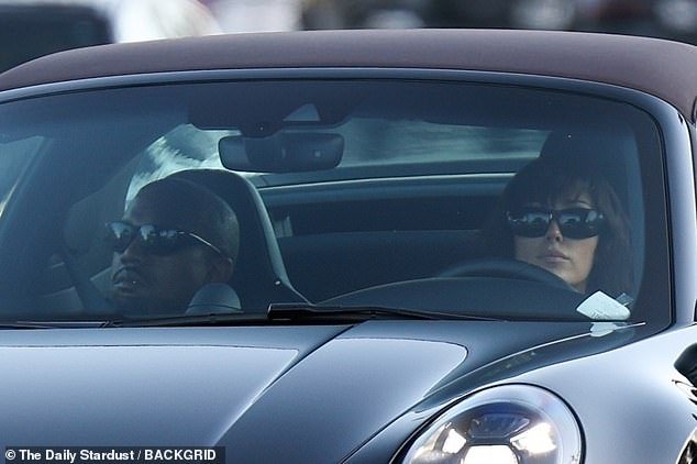 The Australian architect, 30, looked tense on a drive with her spouse, who pouted in the passenger seat next to her