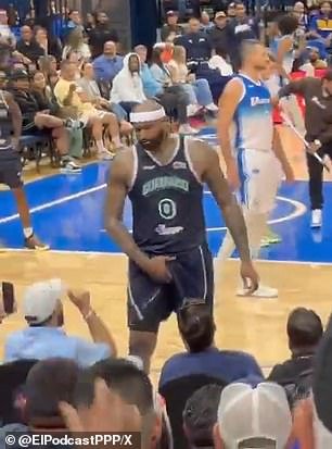 DeMarcus Cousins grabbed his crotch as an altercation with a fan began to escalate