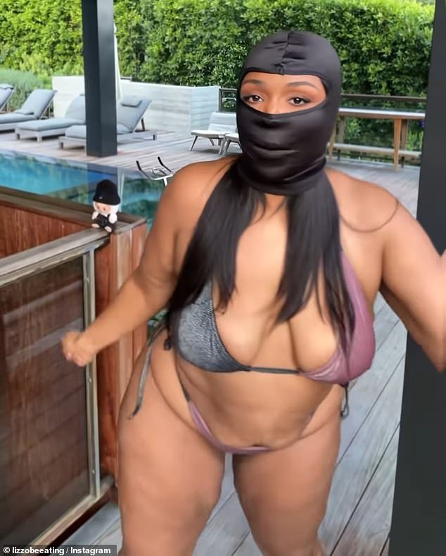 The superstar also donned a black balaclava in the clip, which was seen by her 11.7million followers