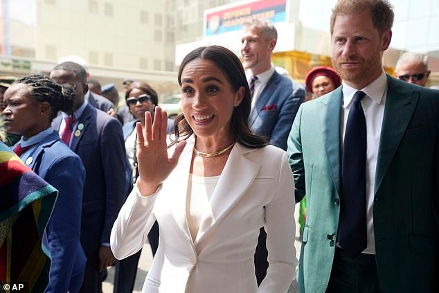Prince Harry and Meghan visit army wives at the Defence headquarters in Abuja, Nigeria on Friday, May 10, 2024