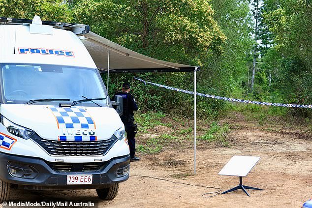 Police are seen at a cordoned-off section of Good Night Scrub National Park on Saturday
